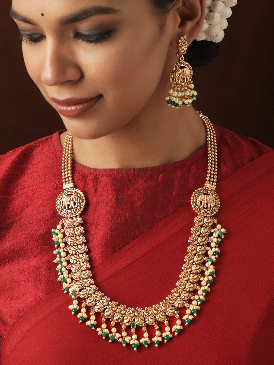 Rubans Illuminating Beauty with a Gold-Toned Temple Necklace Set Jewellery Sets