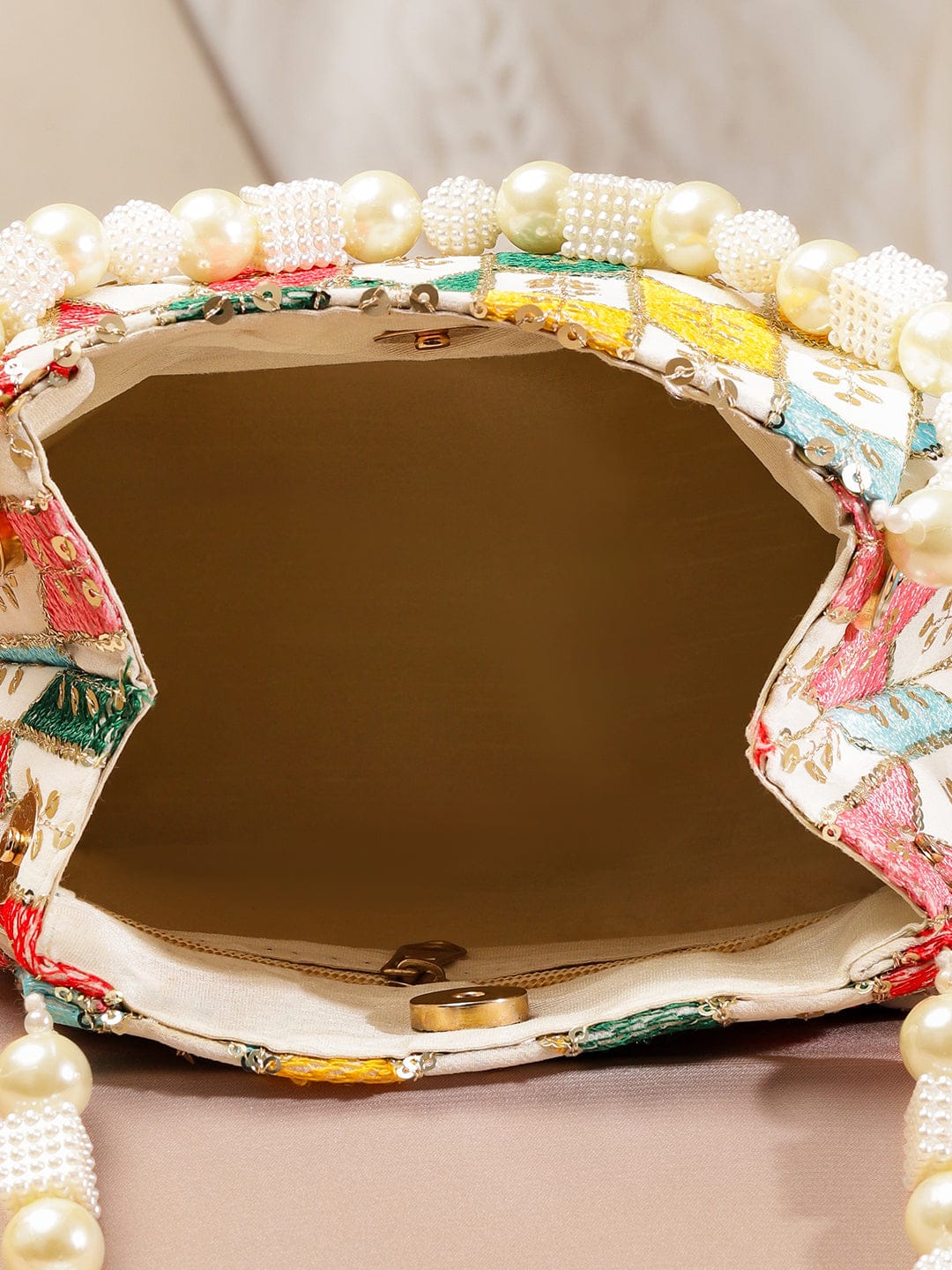Rubans Multicolour Embroidered Potli Bag with Pearl Beaded Handle on Cream Base Bags