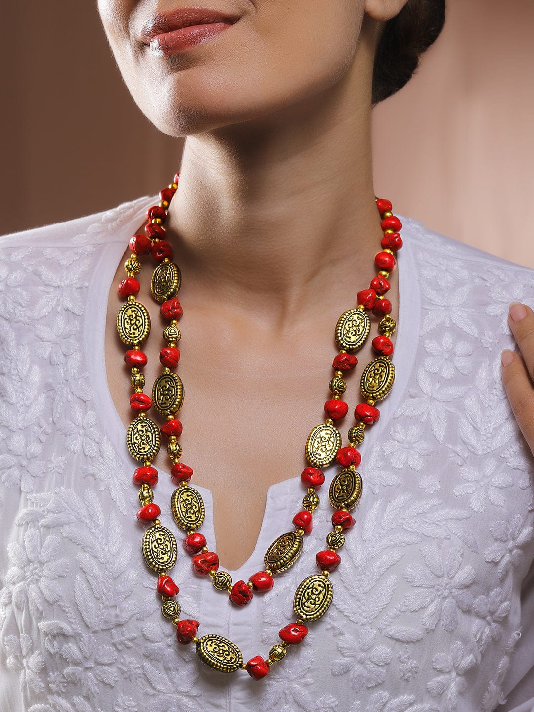 Rubans Oxidised Antique Gold-Plated Dual-Layer Necklace with Red Carved Beads & Tribal Oval Discs Necklace and Chains