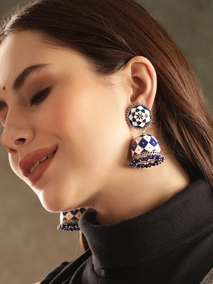 Rubans Oxidized silver Blue & White enamel Blue beaded Statement Jhumka Earrings Earrings