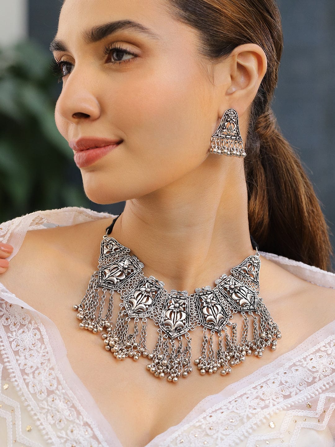 Rubans Oxidized Silver-Plated Floral Motif Statement Choker Necklace Set with Chain Tassels for Women Choker set