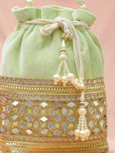 Rubans Pastel Mint Green Velvet Potli Bag with Pearl Handle, Mirror Embroidery & Tassel Detailing Bags