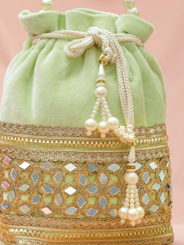 Rubans Pastel Mint Green Velvet Potli Bag with Pearl Handle, Mirror Embroidery & Tassel Detailing Bags