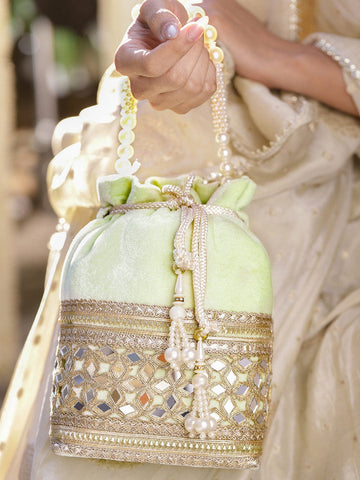 Rubans Pastel Mint Green Velvet Potli Bag with Pearl Handle, Mirror Embroidery & Tassel Detailing Handbag, Wallet Accessories & Clutche