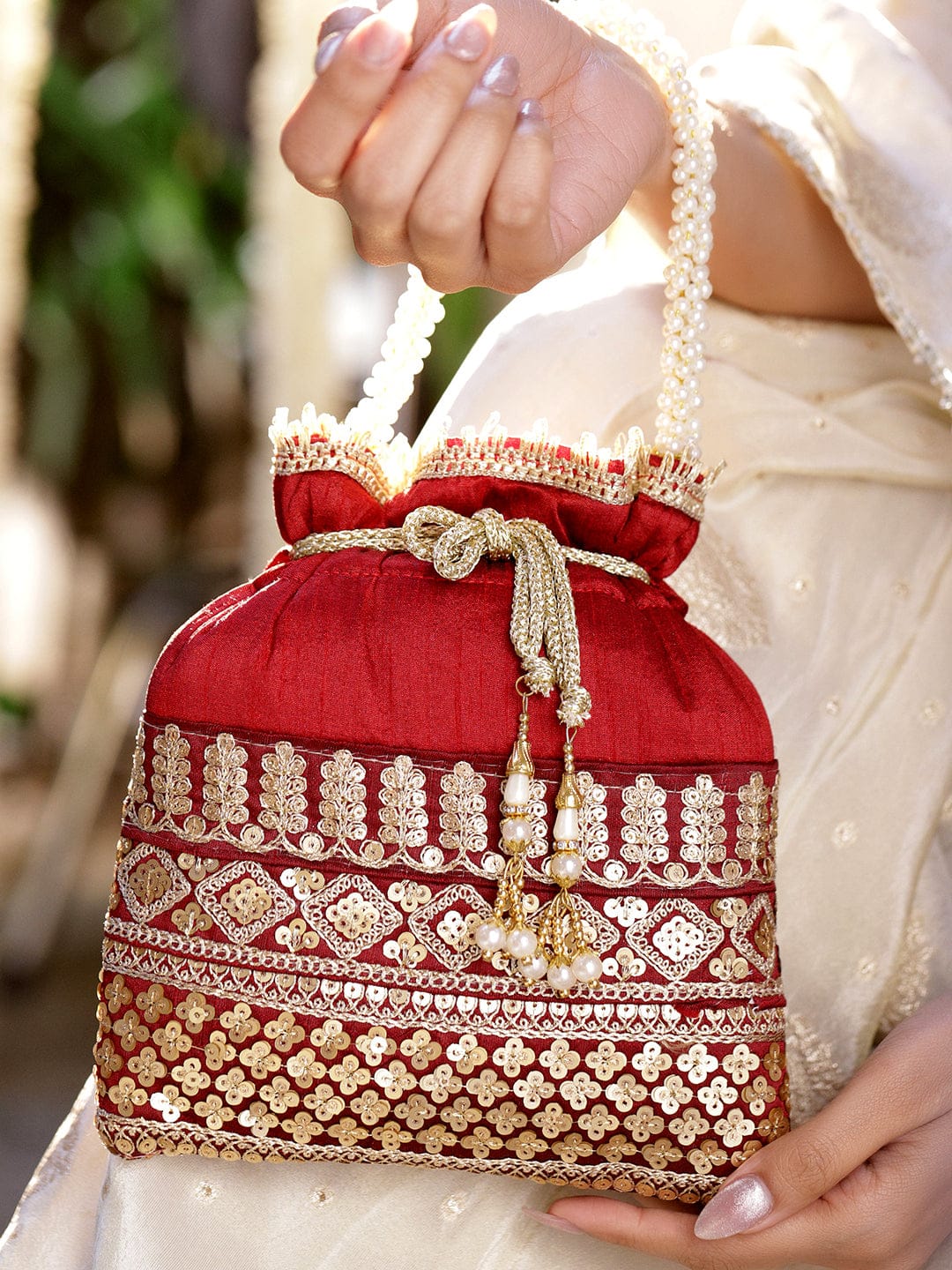 Rubans Red & Gold Embroidered Potli Bag with Pearl Handle & Beaded Tassel Detailing Bags