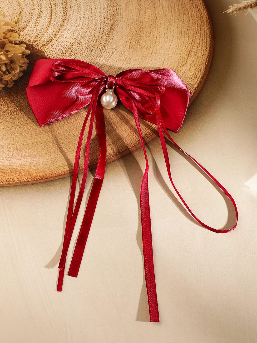 Rubans Red Satin Bow Hair Clip with Pearl Drop & Flowing Ribbon Tails â€“ Elegant & Chic Hair Accessory