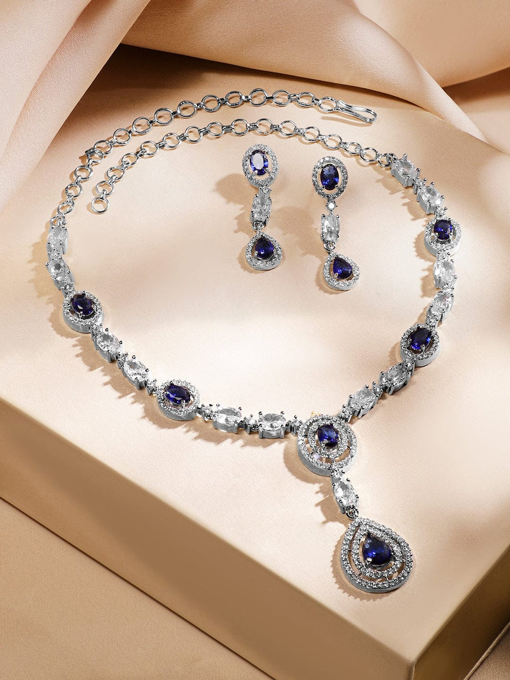 Rubans Rhodium-Plated Blue Sapphire & AAA Cubic Zirconia Studded Halo & Teardrop Design Luxe Necklace Set in Silver Tone for Women Jewellery Set