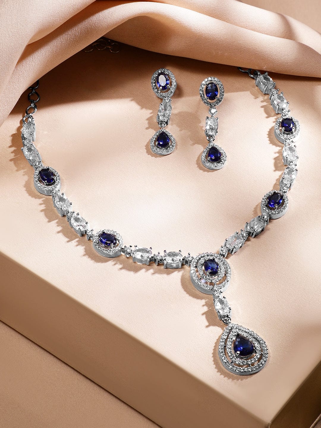 Rubans Rhodium-Plated Blue Sapphire & AAA Cubic Zirconia Studded Halo & Teardrop Design Luxe Necklace Set in Silver Tone for Women Jewellery Set