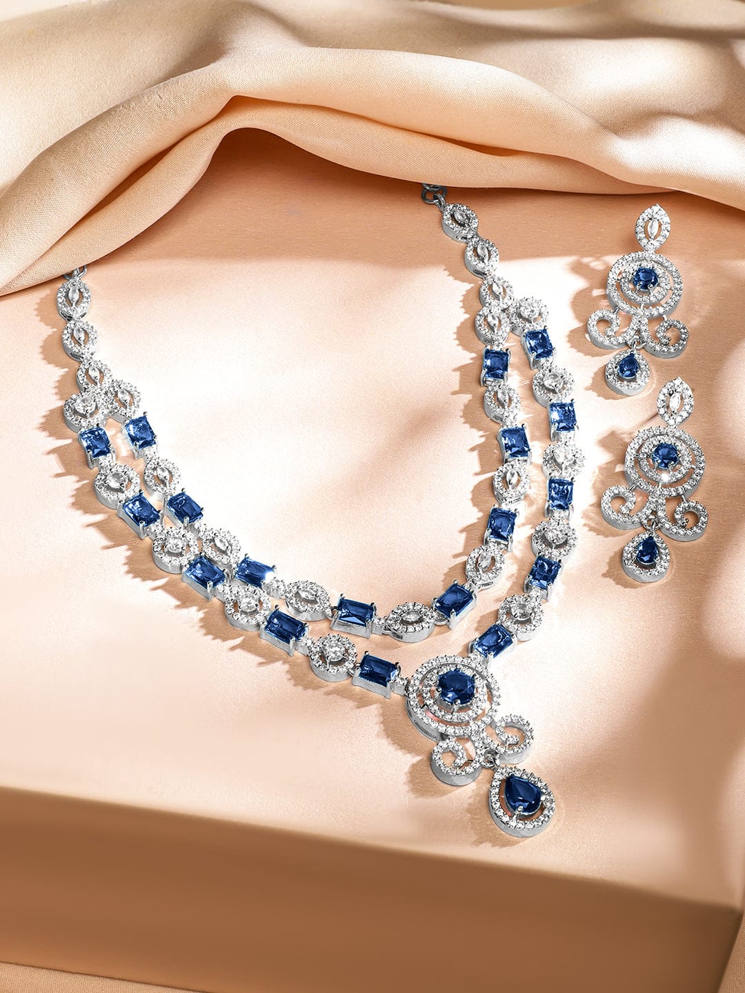 Rubans Rhodium-Plated Blue Sapphire and White Baguette-Cut Cubic Zirconia Studded Luxe Double-Layer Luxe Statement Necklace Set Jewellery Set