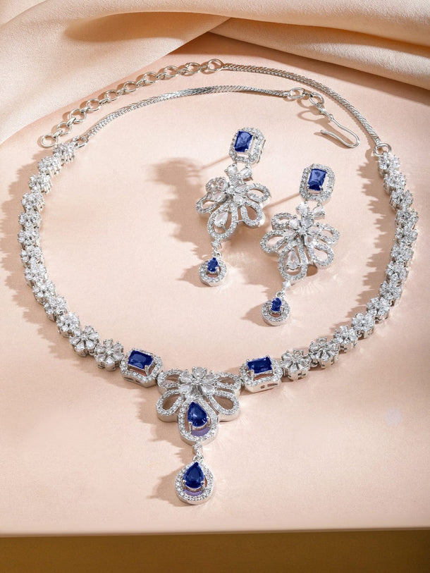 Rubans Rhodium-Plated Blue Sapphire Stone & White Cubic Zirconia Studded Floral Designer Necklace Set Jewellery Set
