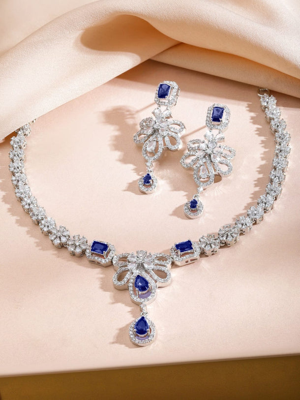 Rubans Rhodium-Plated Blue Sapphire Stone & White Cubic Zirconia Studded Floral Designer Necklace Set Jewellery Set
