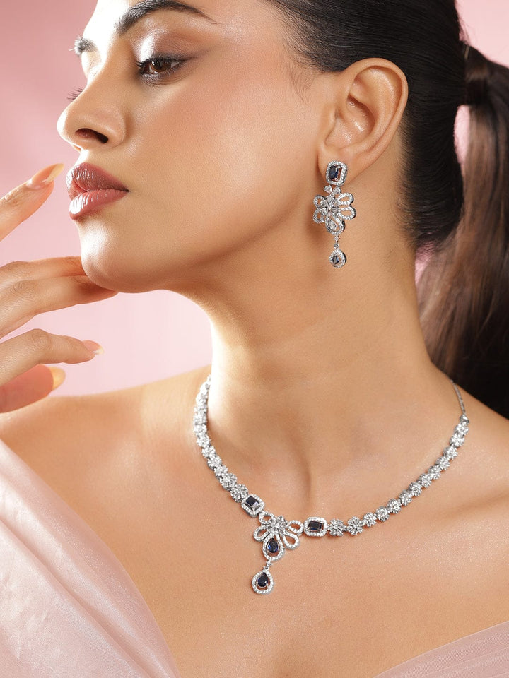 Rubans Rhodium-Plated Blue Sapphire Stone & White Cubic Zirconia Studded Floral Designer Necklace Set Jewellery Set