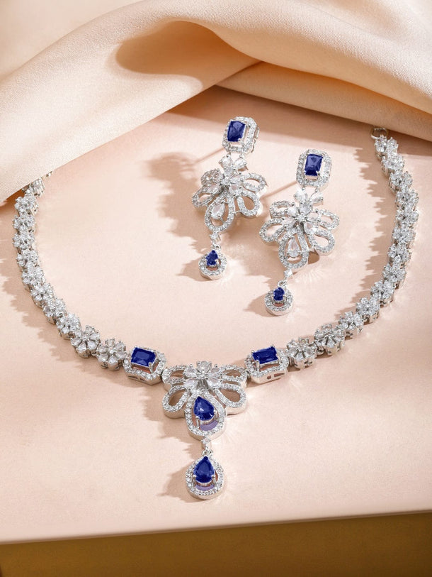 Rubans Rhodium-Plated Blue Sapphire Stone & White Cubic Zirconia Studded Floral Designer Necklace Set Necklace Set