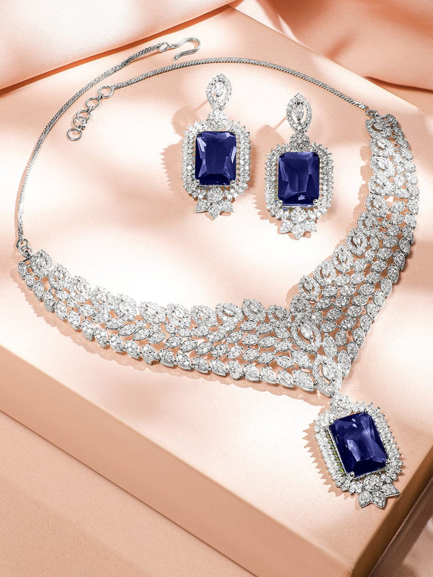 Rubans Rhodium-Plated Blue Sapphire & White Cubic Zirconia Studded Luxe V-Shaped Statement Necklace Set Jewellery Set
