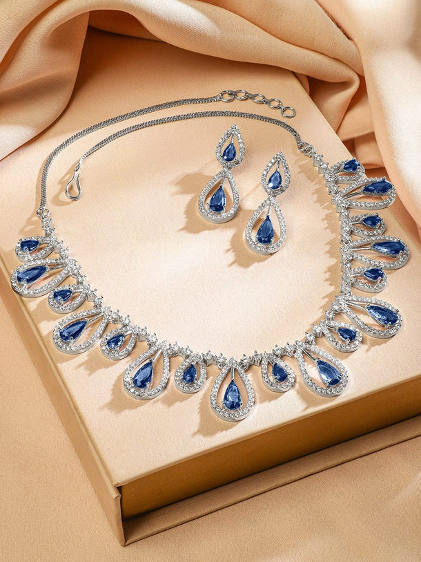 Rubans Rhodium Plated Blue Sapphire & White Cubic Zirconia Studded Teardrop Design Premium Jewellery Set Jewellery Set