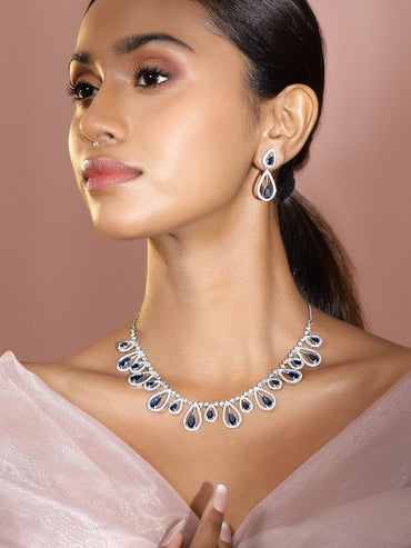 Rubans Rhodium Plated Blue Sapphire & White Cubic Zirconia Studded Teardrop Design Premium Jewellery Set Jewellery Set