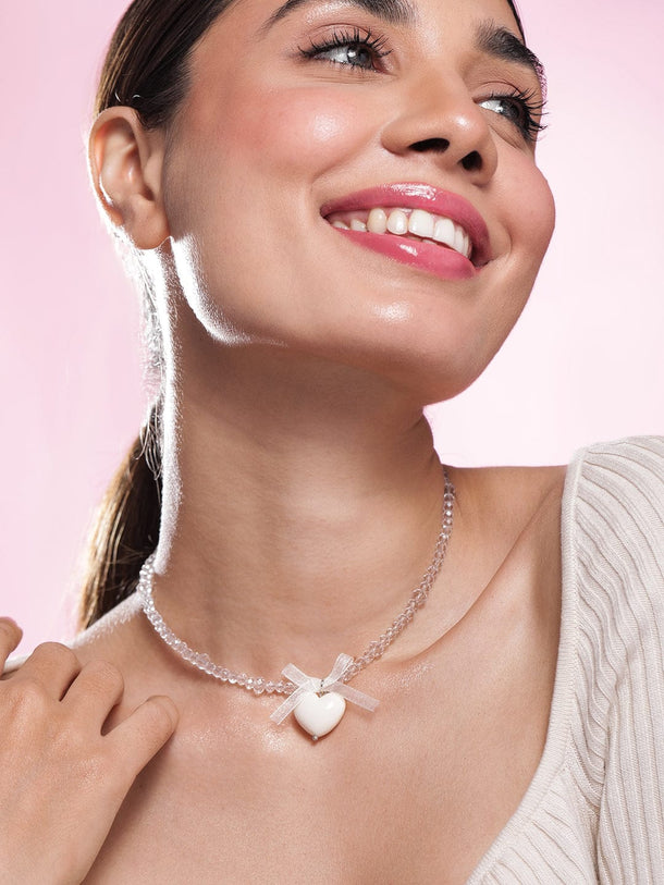 Rubans Rhodium Plated Crystal Beaded Necklace with Heart Pendant and Bow Detailing Necklace & Chains