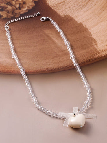 Rubans Rhodium Plated Crystal Beaded Necklace with Heart Pendant and Bow Detailing Necklace & Chains