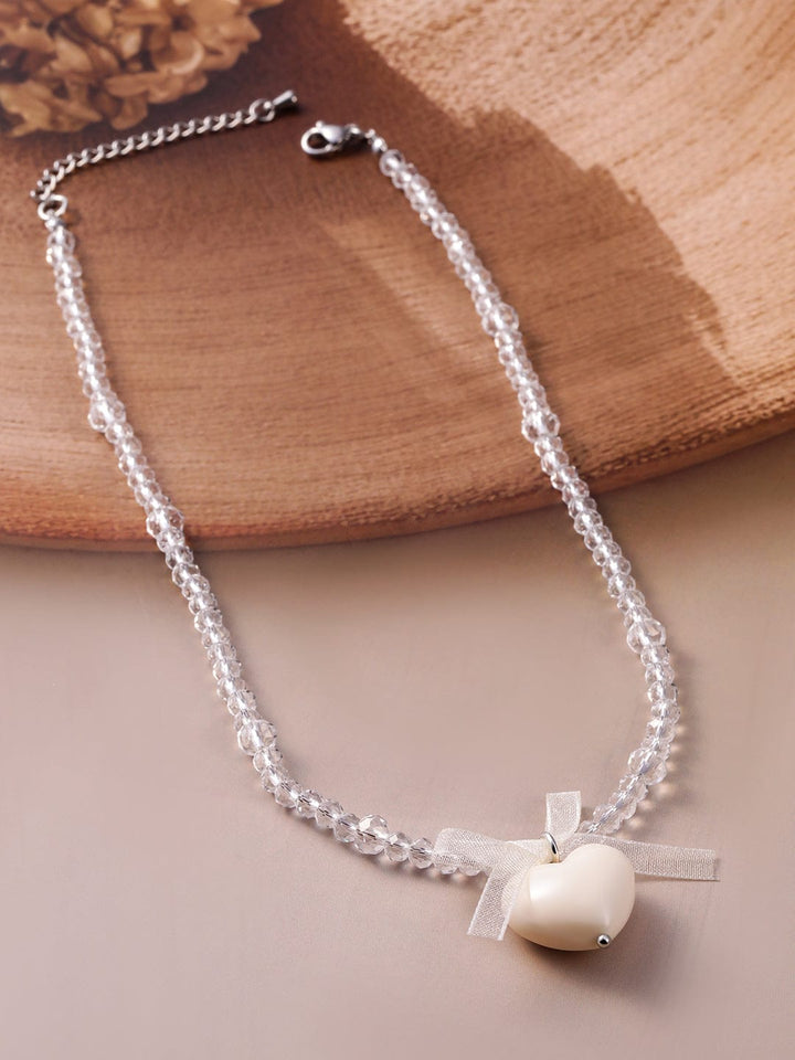 Rubans Rhodium Plated Crystal Beaded Necklace with Heart Pendant and Bow Detailing Necklace & Chains