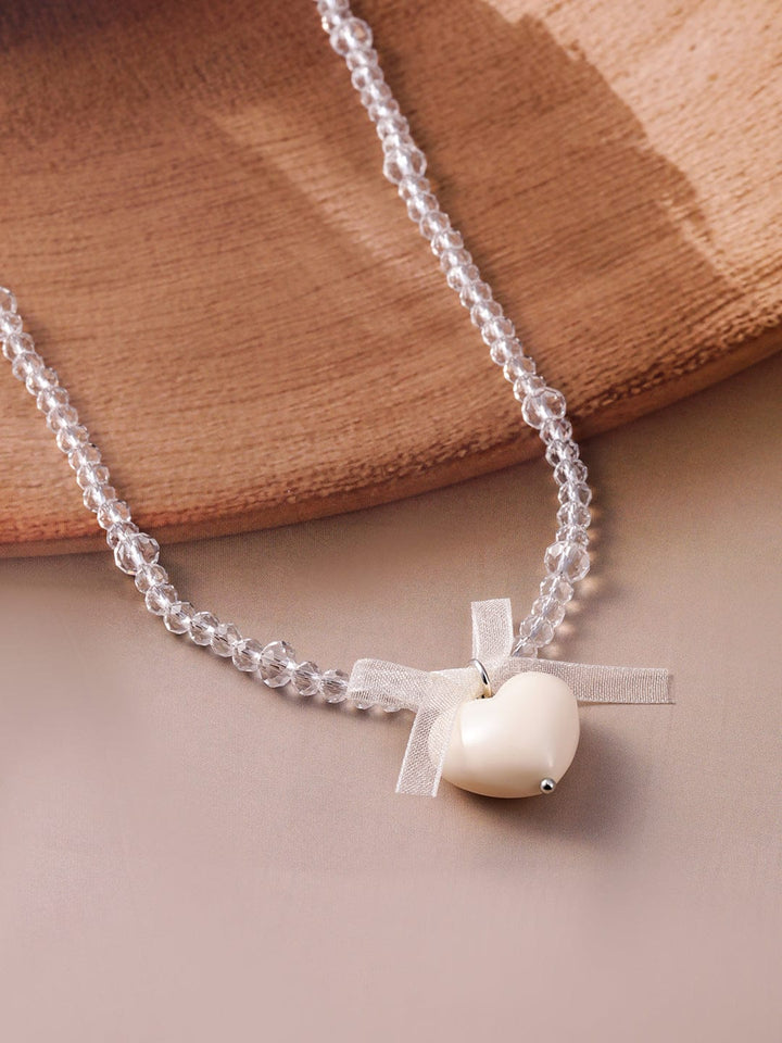 Rubans Rhodium Plated Crystal Beaded Necklace with Heart Pendant and Bow Detailing Necklace & Chains