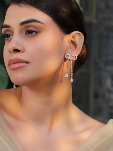 Rubans Rhodium Plated Cubic Zirconia Bow Drop Earrings Earrings