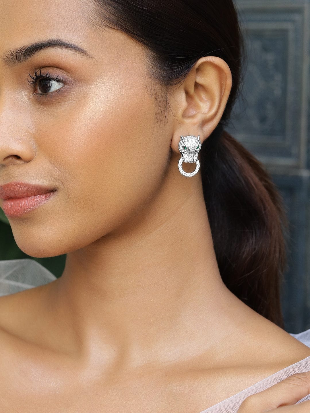 Rubans Rhodium-Plated Cubic Zirconia Panther Design Stud Earrings with Emerald Accents Earrings