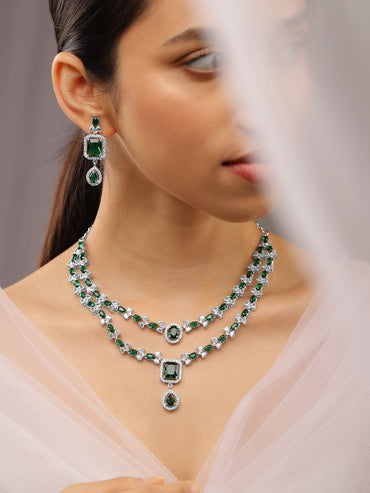 Rubans Rhodium-Plated Emerald Green & White Cubic Zirconia Studded Luxe Layer Necklace Set Necklace Set
