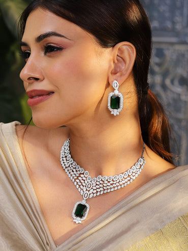 Rubans Rhodium-Plated Emerald Green & White Cubic Zirconia Studded Luxe V-Shaped Statement Necklace Set Jewellery Set