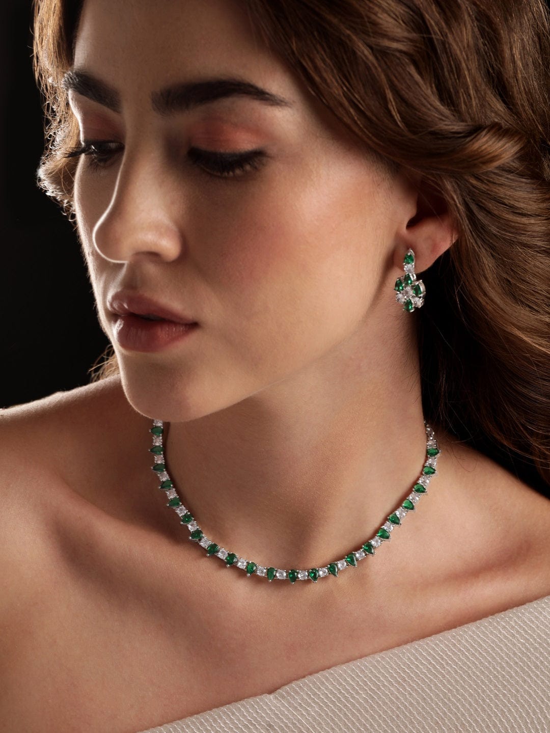 Rubans Rhodium Plated Emerald Green Zirconia Studded Sleek Necklace Set Jewellery Sets