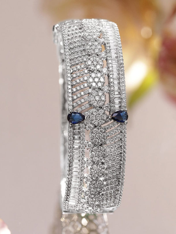 Rubans Rhodium-Plated Floral Design Bracelet with Blue Sapphire & Cubic Zirconia Accents Wristwear
