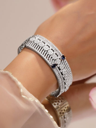 Rubans Rhodium-Plated Floral Design Bracelet with Blue Sapphire & Cubic Zirconia Accents Wristwear