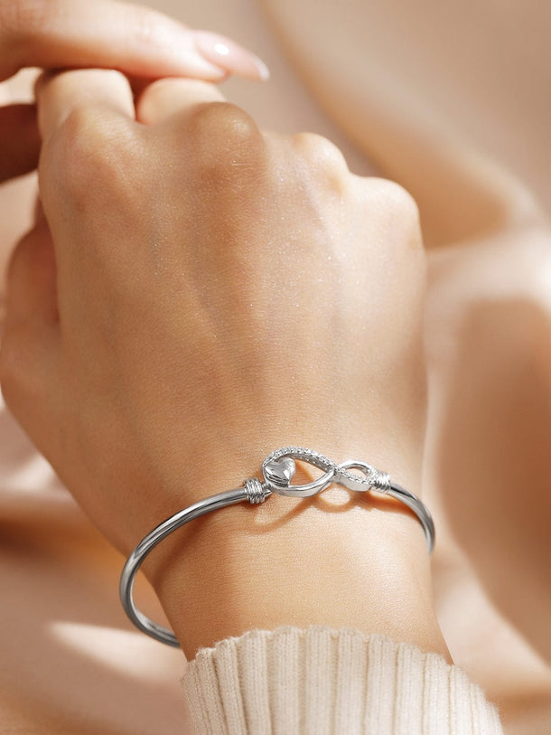 Rubans Rhodium-Plated Infinity & Heart Motif Crystal Zirconia Studded Sleek Bracelet Wristwear
