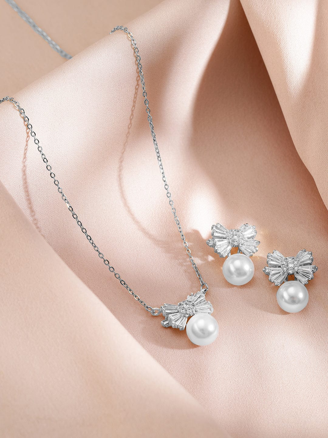 Rubans Rhodium-Plated Pearl and Crystal Bow Pendant Necklace and Earrings Jewellery Set
