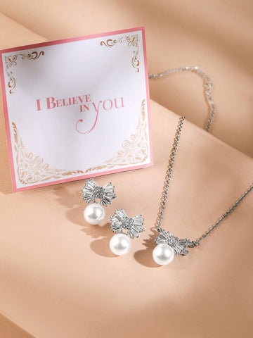 Rubans Rhodium-Plated Pearl and Crystal Bow Pendant Necklace and Earrings Necklace & Chain