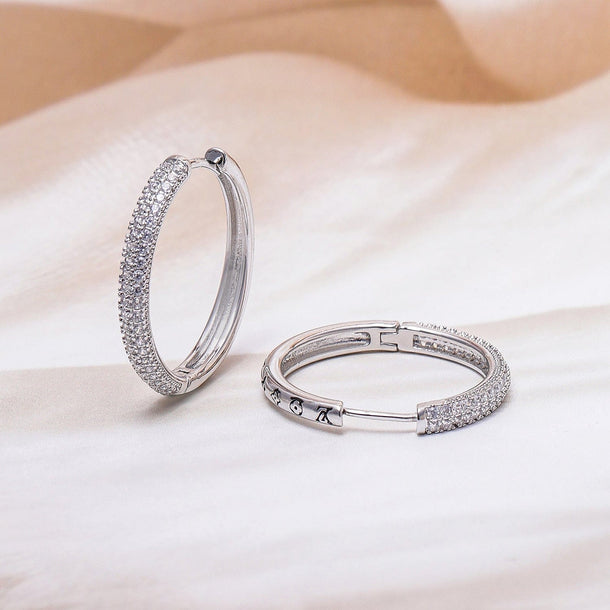 Rubans Rhodium Plated Sparkling Cubic Zirconia Studded Hoop Earrings Earrings