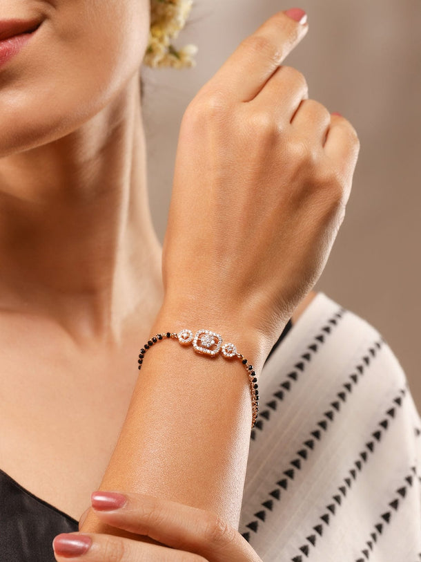 Rubans Rose Gold-Plated White Cubic Zirconia Studded Floral Mangalsutra Bracelet with Black Beads for Women Bangles & Bracelet