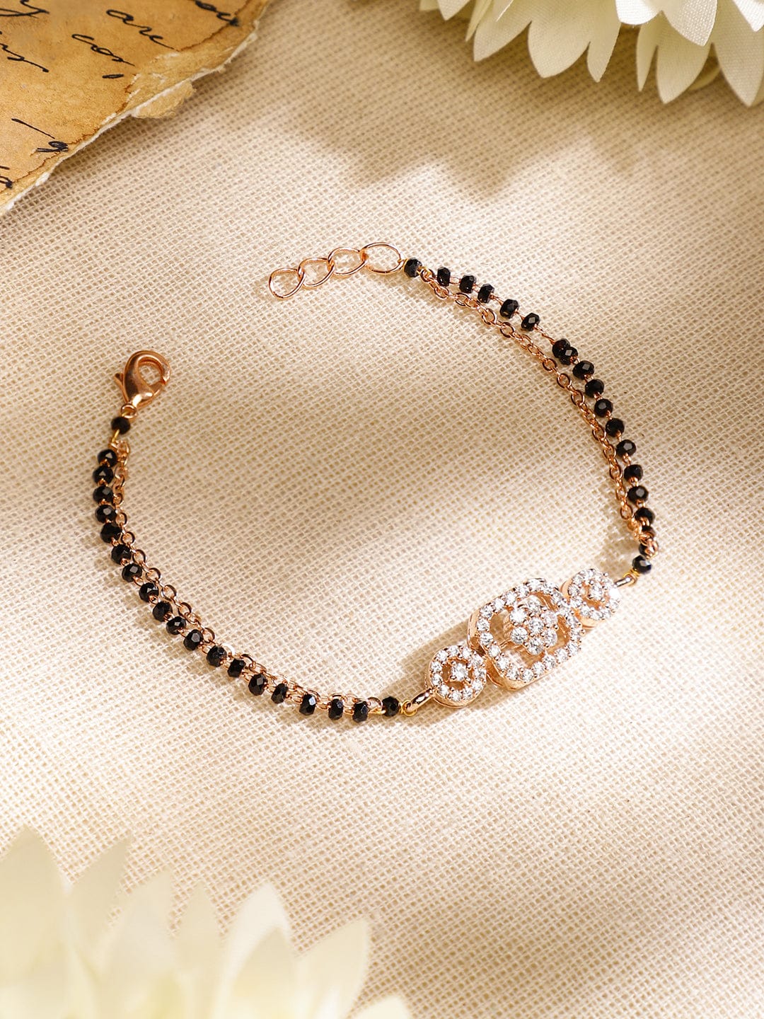 Rubans Rose Gold-Plated White Cubic Zirconia Studded Floral Mangalsutra Bracelet with Black Beads for Women Mangalsutra