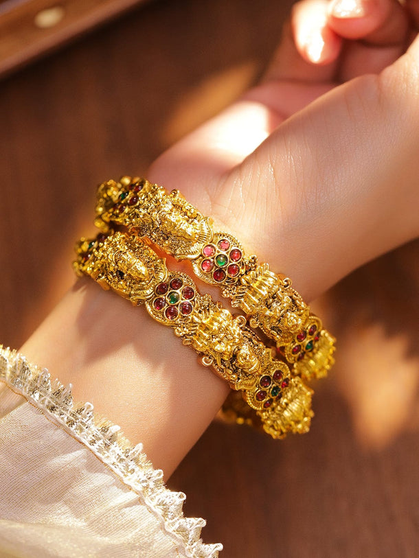 Rubans Set of 2 24K Gold-Plated Ruby Red & Green Stone Studded Temple Bangles with Lakshmi Motif Bangles & Bracelet