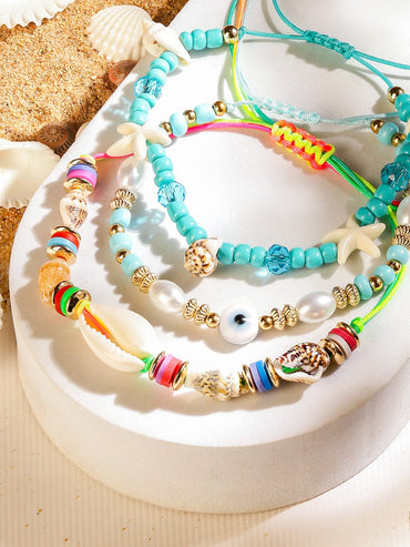 Rubans Set of 3 Adjustable Cord Anklets in Aqua & Multicolour Tones with Shell Beads Evil Eye & Starfish Charms Wristwear
