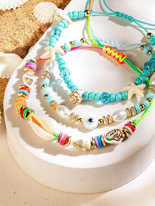 Rubans Set of 3 Adjustable Cord Anklets in Aqua & Multicolour Tones with Shell Beads Evil Eye & Starfish Charms Wristwear