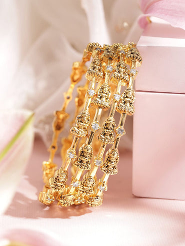 Rubans Set of 4, 22K Gold plated Zirconia Studded Goddess Motif Handcrafted Temple Bangles Bangles & Bracelets