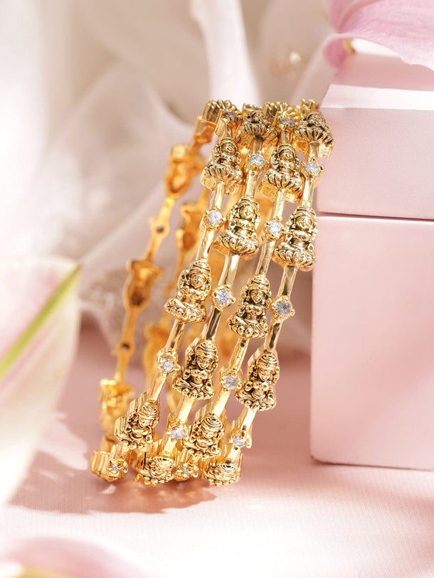 Rubans Set of 4, 22K Gold plated Zirconia Studded Goddess Motif Handcrafted Temple Bangles Bangles & Bracelets