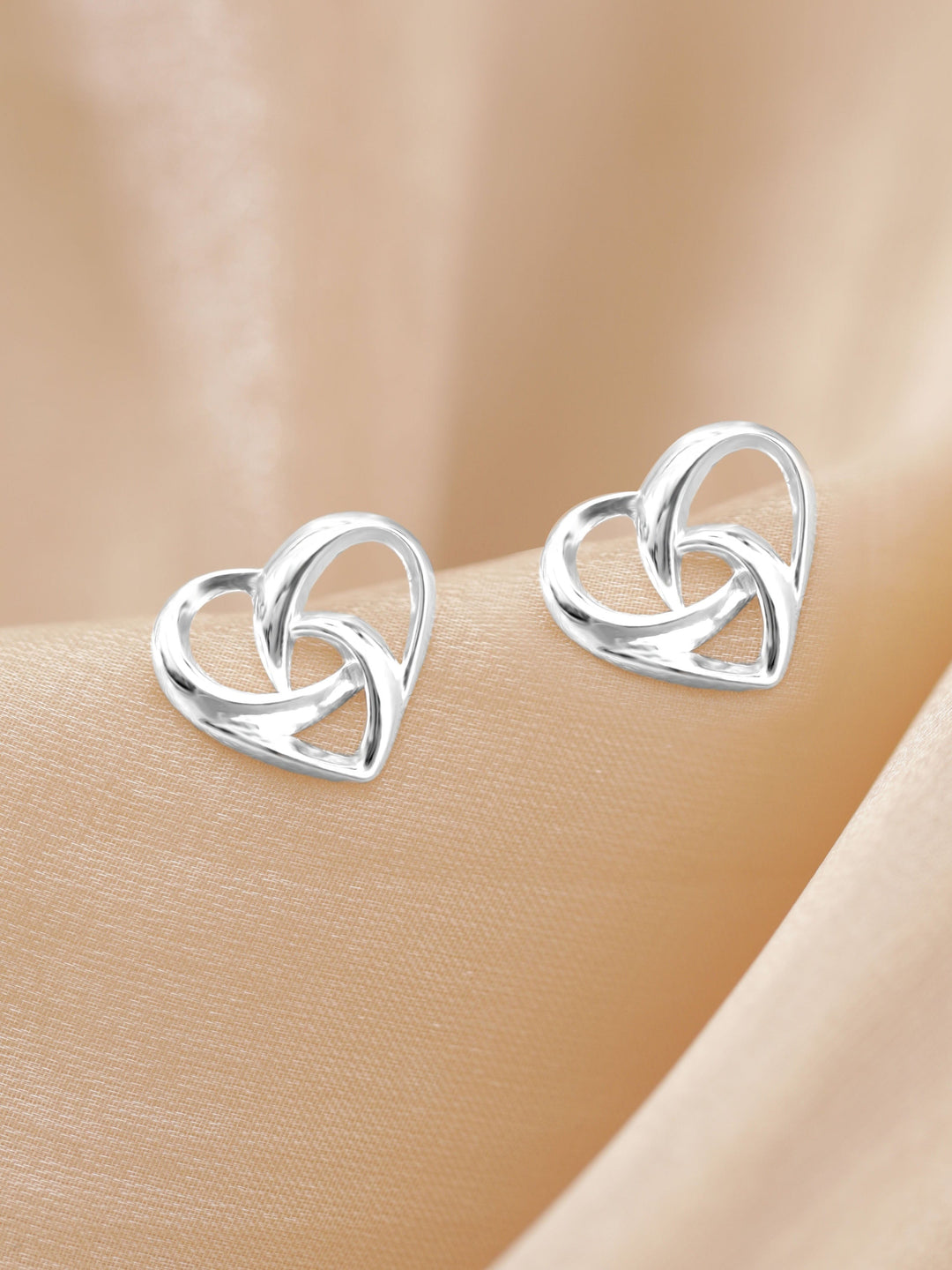 Rubans Silver Rhodium-Plated Heart Shaped Studs Earrings Earrings
