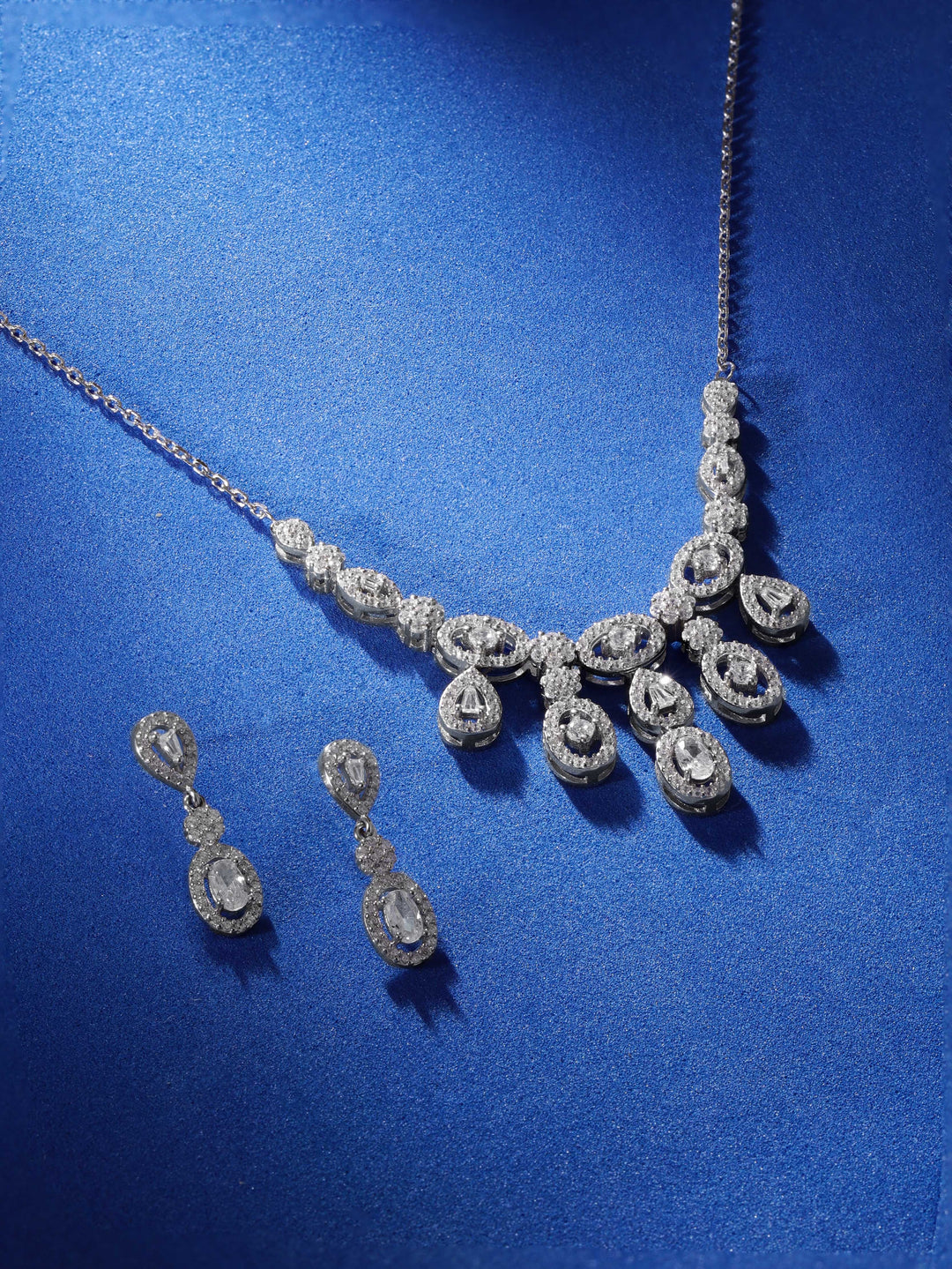 Rubans Silver Rhodium Plated Pave Zirconia Studded Minimal Dangle  Necklace Set Jewellery Sets