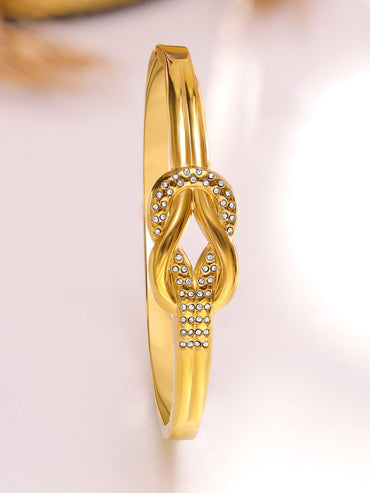 Rubans Voguish 18K Gold-Plated Knot Motif Stainless Steel Tarnish-Free Waterproof Bracelet with CZ Accents Wristwear