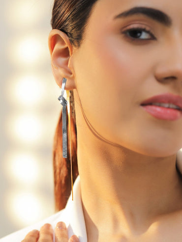 Rubans Voguish Dual-Plated Knotted Gold & Silver Bold Long Tassel Drop Earrings Earrings