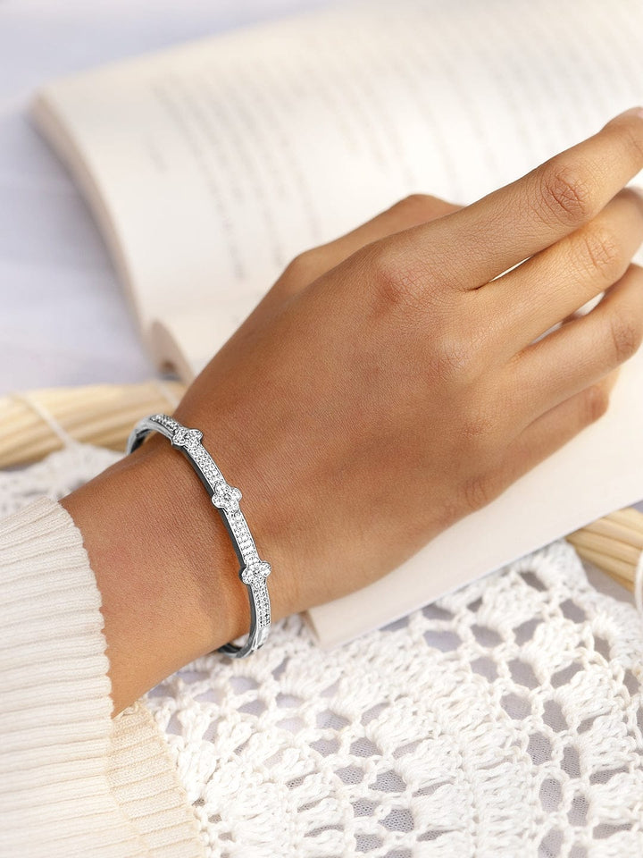 Rubans Voguish Rhodium-Plated Floral Motif Bangle Style Bracelete with Cubic Zirconia Wristwear