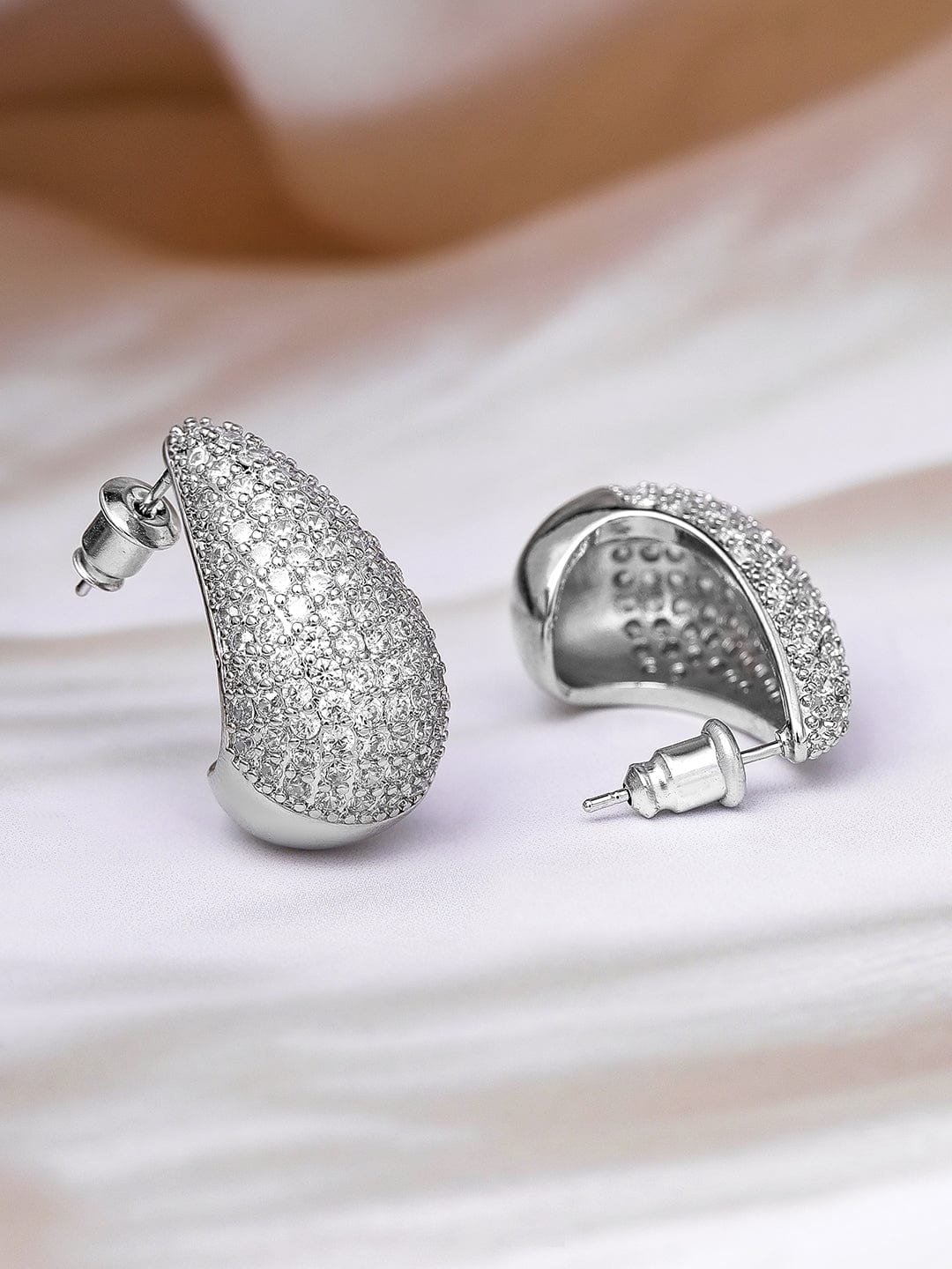 Rubans Voguish Rhodium Plated Sparkling AD & Cubic Zirconia Studded Teardrop Earrings Stud