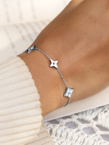 Rubans Voguish Rhodium Plated StainlessSteel TarnishFree Waterproof Floral Charm Bracelet Bracelet