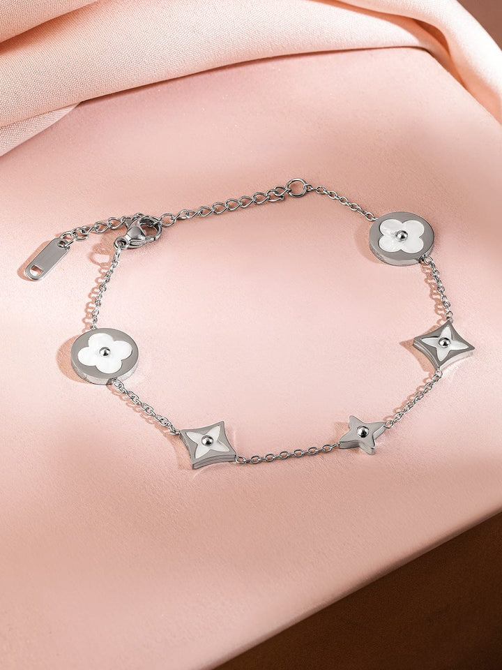 Rubans Voguish Rhodium Plated StainlessSteel TarnishFree Waterproof Floral Charm Bracelet Wristwear